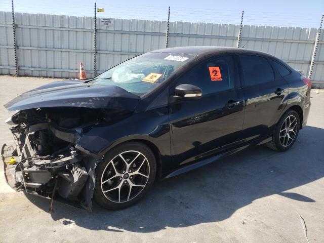 FORD FOCUS SE 2015 with VIN 1FADP3F20FL348871 - Photo from auction