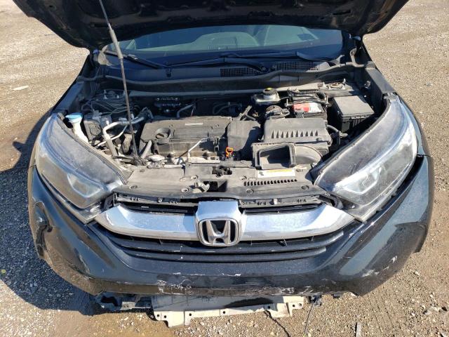 Photo 11 from auction – 2017 HONDA CR-V LX with VIN 7FARW5H33HE008404