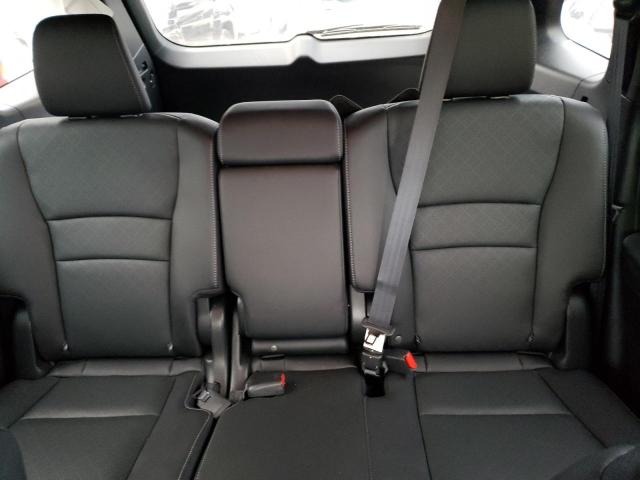 Photo 10 from auction – 2021 HONDA PASSPORT E with VIN 5FNYF7H58MB002905