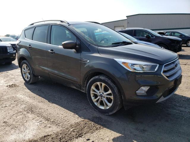 Photo 4 from auction – 2018 FORD ESCAPE SE with VIN 1FMCU9GD5JUA38943