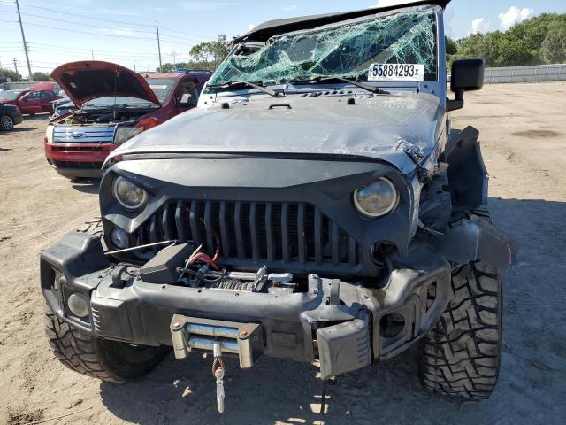 Photo 5 from auction – 2014 JEEP WRANGLER U with VIN 1C4BJWDG6EL198394