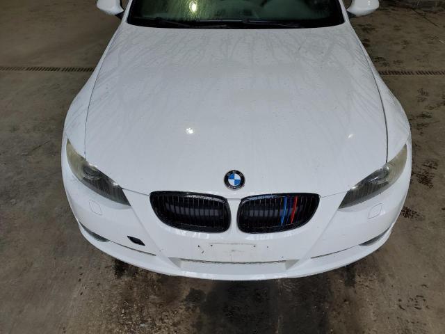 Photo 11 from auction – 2009 BMW 335 I with VIN WBAWL73539P181775