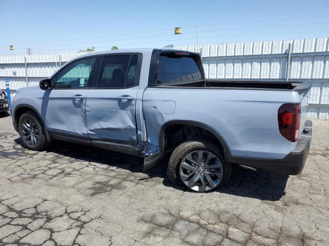 Photo 2 from auction – 2023 HONDA RIDGELINE with VIN 5FPYK3F16PB033084
