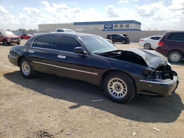 Photo 4 from auction – 2000 LINCOLN TOWN CAR C with VIN 1LNHM83W3YY874180