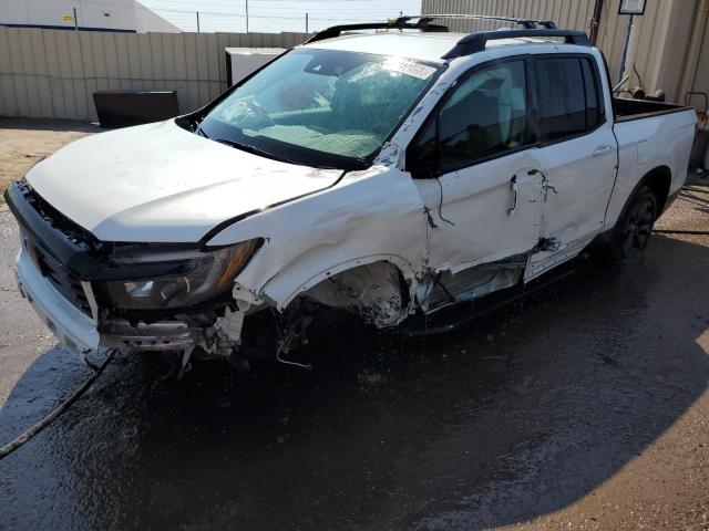 HONDA RIDGELINE 2021 with VIN 5FPYK3F11MB000571 - Photo from auction