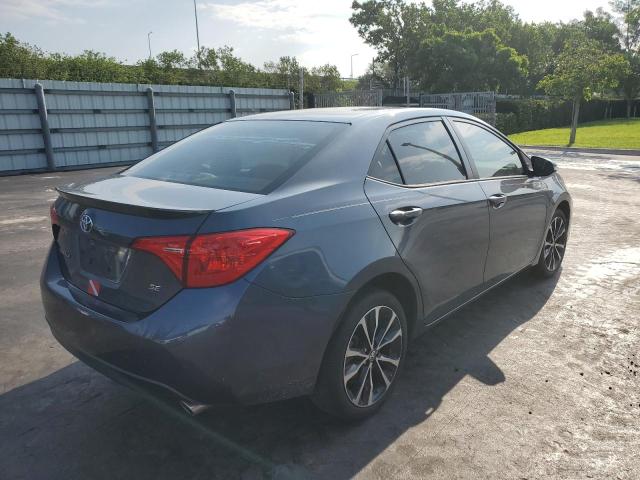 Photo 3 from auction – 2017 TOYOTA COROLLA L with VIN 5YFBURHE2HP647227