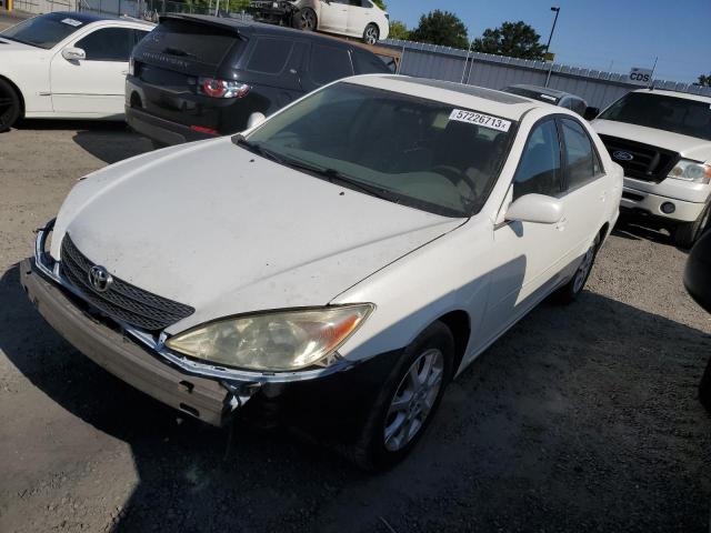 Photo 1 from auction – 2004 TOYOTA CAMRY LE with VIN JTDBE32K840249565