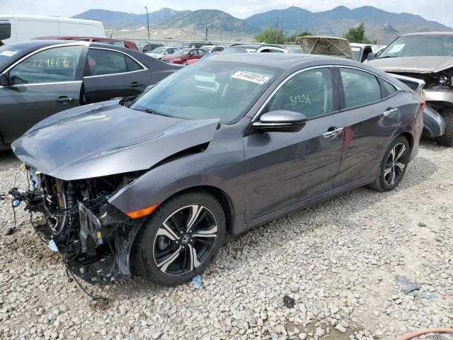 HONDA CIVIC TOUR 2017 with VIN 19XFC1F97HE013151 - Photo from auction