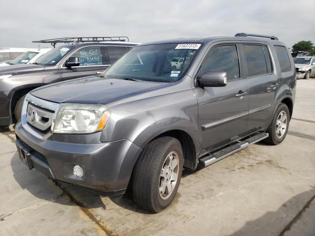 HONDA PILOT TOUR 2011 with VIN 5FNYF3H92BB023600 - Photo from auction