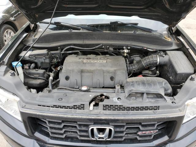 Photo 11 from auction – 2014 HONDA RIDGELINE with VIN 5FPYK1F7XEB006556