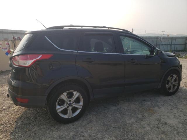 Photo 3 from auction – 2014 FORD ESCAPE SE with VIN 1FMCU9G94EUE34685