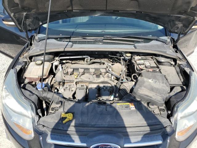 Photo 11 from auction – 2013 FORD FOCUS SE with VIN 1FADP3F20DL335406