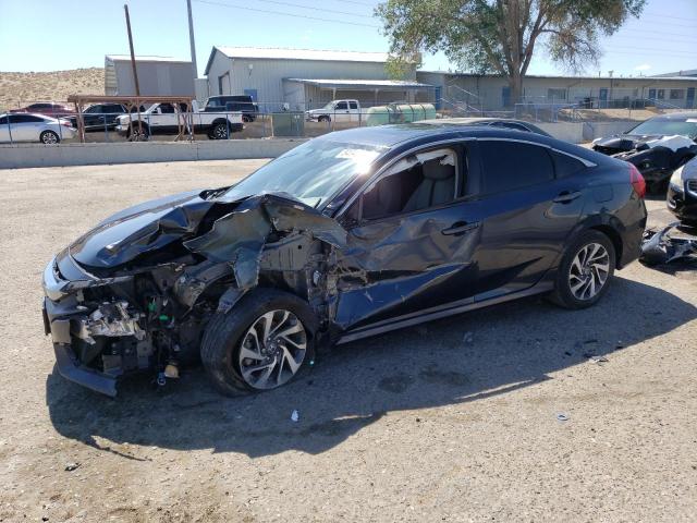 HONDA CIVIC EX 2018 with VIN 19XFC2F77JE004766 - Photo from auction