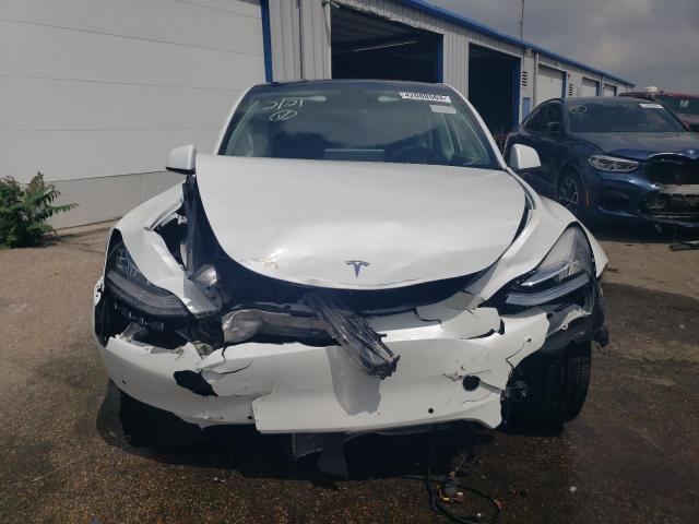 Photo 5 from auction – 2021 TESLA MODEL Y with VIN 5YJYGAEE5MF298092