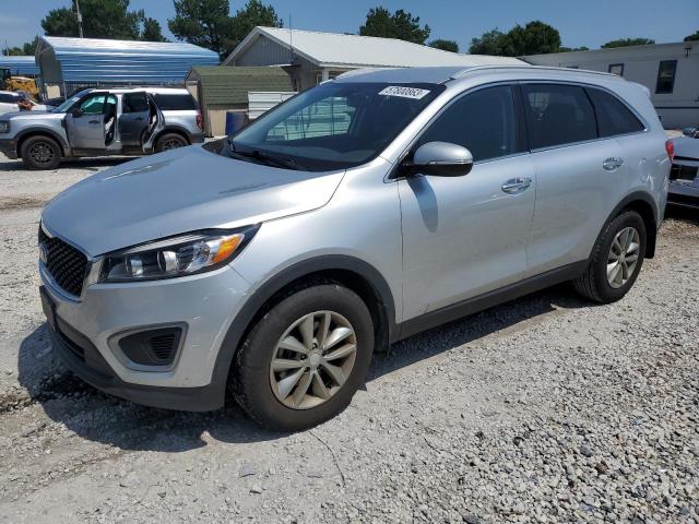 KIA SORENTO LX 2016 with VIN 5XYPG4A37GG096479 - Photo from auction