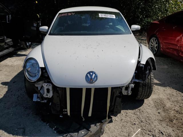 Photo 5 from auction – 2012 VOLKSWAGEN BEETLE with VIN 3VWJP7AT2CM642445