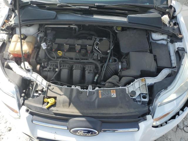 Photo 11 from auction – 2014 FORD FOCUS SE with VIN 1FADP3K23EL415631