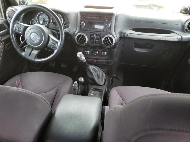 Photo 8 from auction – 2014 JEEP WRANGLER U with VIN 1C4BJWDG5EL100973