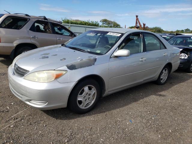TOYOTA CAMRY LE 2002 with VIN 4T1BF32K42U522290 - Photo from auction