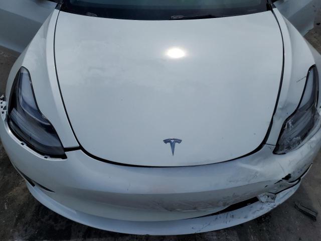 Photo 11 from auction – 2022 TESLA MODEL 3 with VIN 5YJ3E1EB6NF152615