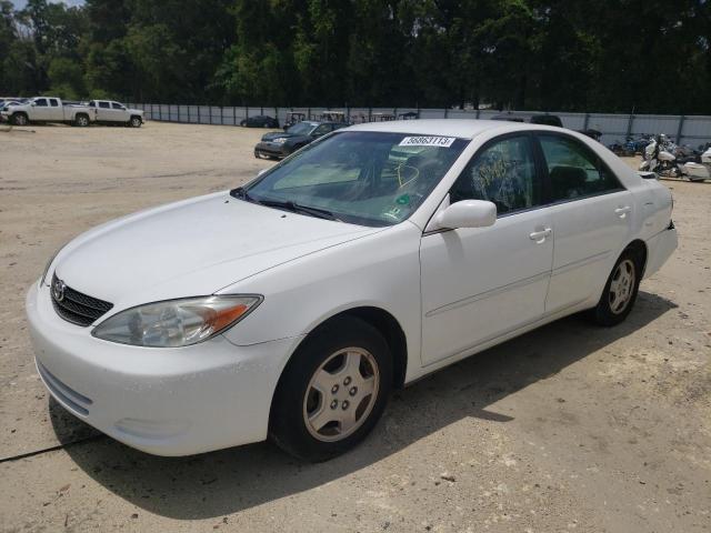 TOYOTA CAMRY 2002 with VIN 4T1BF32K22U009670 - Photo from auction