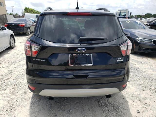 Photo 6 from auction – 2018 FORD ESCAPE SE with VIN 1FMCU0GD1JUC10879