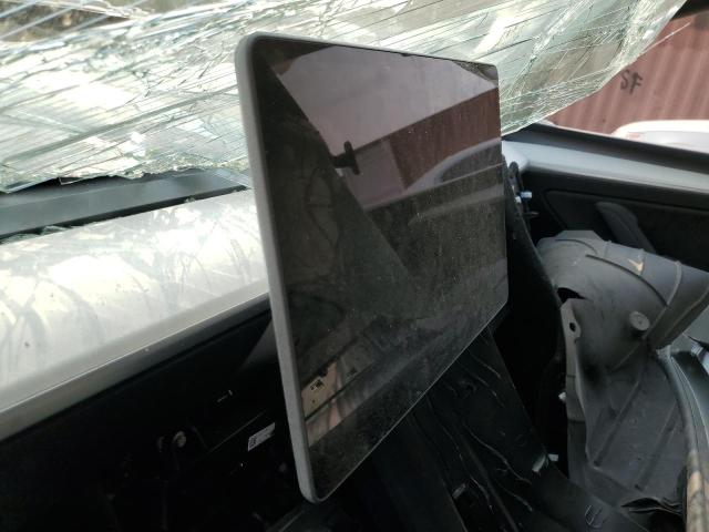 Photo 9 from auction – 2023 TESLA MODEL Y with VIN 7SAYGAEEXPF663860