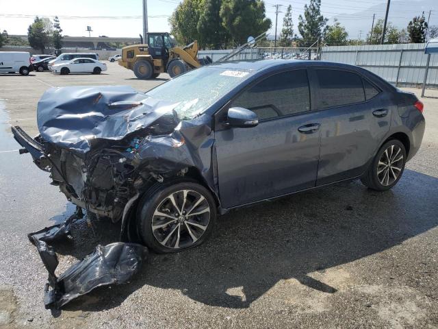 TOYOTA COROLLA L 2018 with VIN 5YFBURHE1JP746594 - Photo from auction