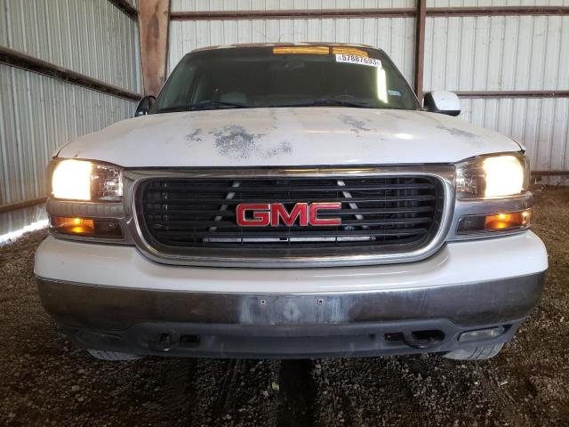 Photo 5 from auction – 2003 GMC YUKON with VIN 1GKEC13V33J303643