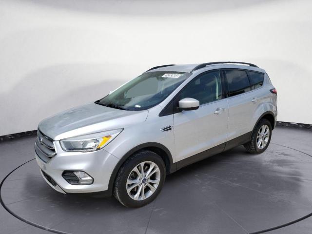 FORD ESCAPE SE 2018 with VIN 1FMCU9GD1JUB16182 - Photo from auction