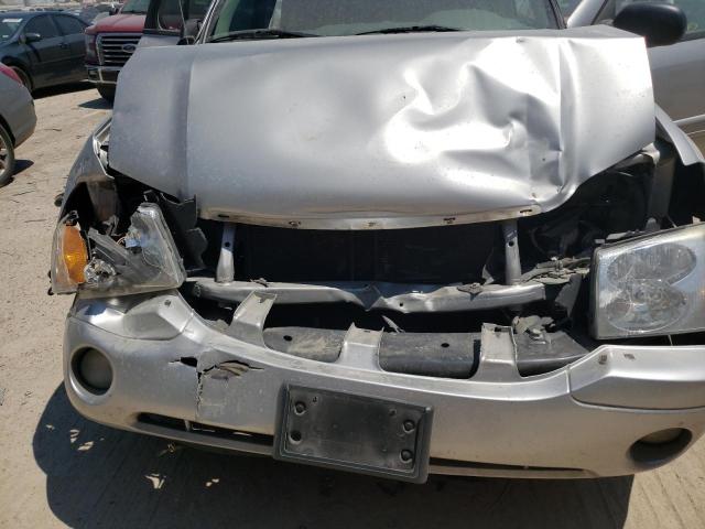 Photo 12 from auction – 2005 GMC ENVOY with VIN 1GKDS13S452154189