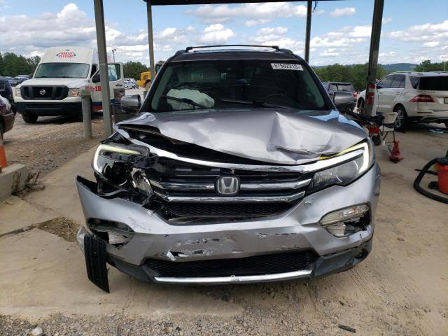 Photo 5 from auction – 2016 HONDA PILOT TOUR with VIN 5FNYF5H94GB033659