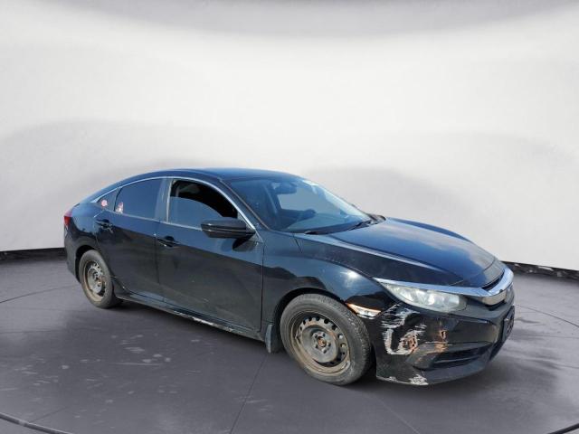 Photo 4 from auction – 2017 HONDA CIVIC LX with VIN 2HGFC2F5XHH553876