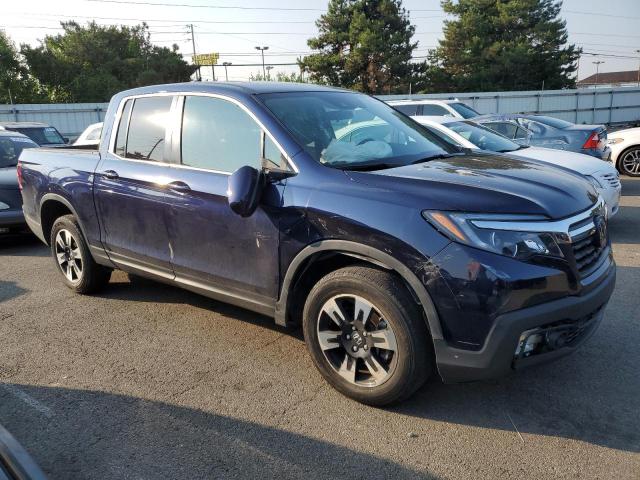 Photo 4 from auction – 2020 HONDA RIDGELINE with VIN 5FPYK3F52LB030387