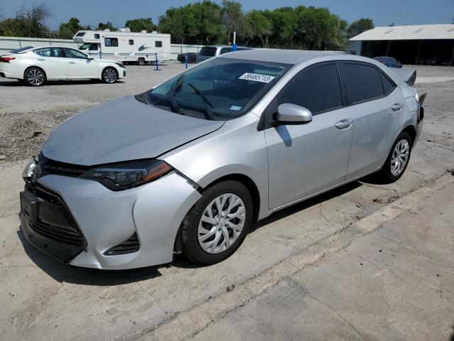 TOYOTA COROLLA L 2019 with VIN 5YFBURHE3KP890651 - Photo from auction