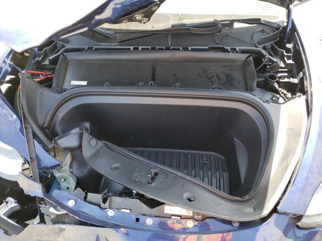 Photo 12 from auction – 2022 TESLA MODEL Y with VIN 7SAYGDEE2NF570300