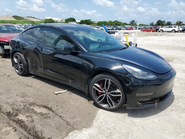 Photo 4 from auction – 2022 TESLA MODEL 3 with VIN 5YJ3E1EC7NF103593