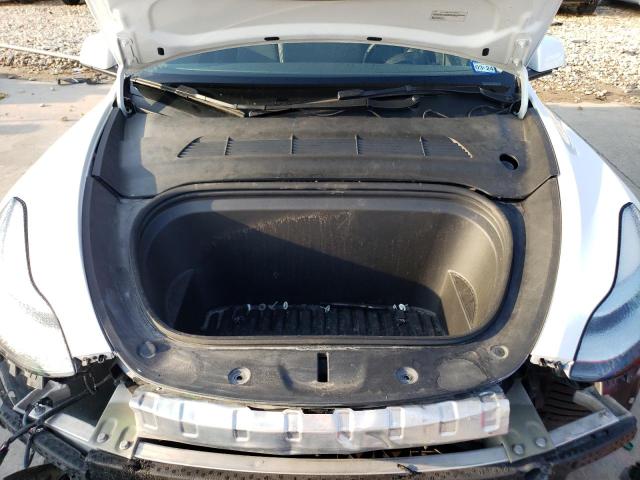 Photo 11 from auction – 2022 TESLA MODEL Y with VIN 7SAYGDEE1NF386286
