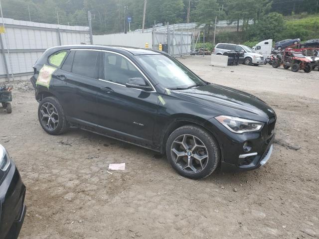 Photo 4 from auction – 2016 BMW X1 XDRIVE2 with VIN WBXHT3C38G5E49558