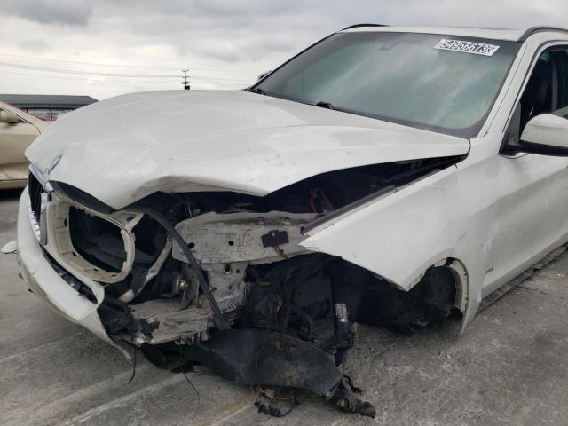 Photo 13 from auction – 2015 BMW X5 SDRIVE3 with VIN 5UXKR2C52F0H41052