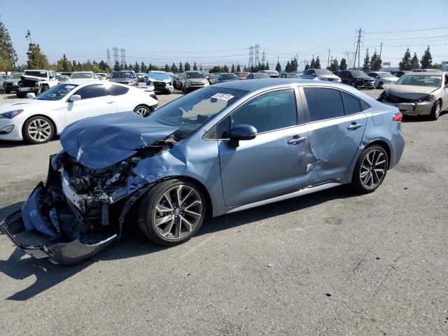 TOYOTA COROLLA SE 2021 with VIN 5YFS4MCE7MP064396 - Photo from auction