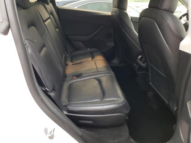 Photo 11 from auction – 2022 TESLA MODEL Y with VIN 7SAYGAEE4NF329367