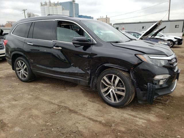 Photo 4 from auction – 2017 HONDA PILOT TOUR with VIN 5FNYF6H9XHB002410
