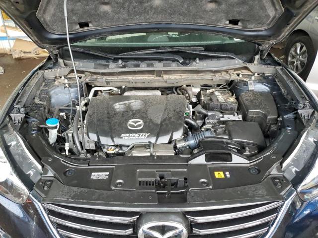 Photo 11 from auction – 2016 MAZDA CX-5 TOURI with VIN JM3KE2CY2G0654037