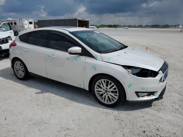 Photo 4 from auction – 2017 FORD FOCUS TITA with VIN 1FADP3N23HL293580