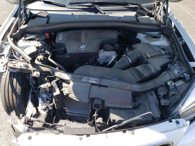 Photo 11 from auction – 2014 BMW X1 XDRIVE2 with VIN WBAVL1C54EVY18879