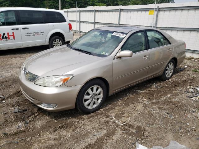 TOYOTA CAMRY LE 2003 with VIN 4T1BE30K63U765588 - Photo from auction