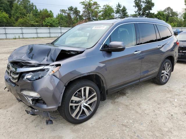 HONDA PILOT ELIT 2016 with VIN 5FNYF6H02GB115297 - Photo from auction