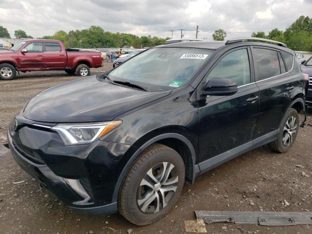 TOYOTA RAV4 LE 2018 with VIN 2T3BFREV0JW725630 - Photo from auction