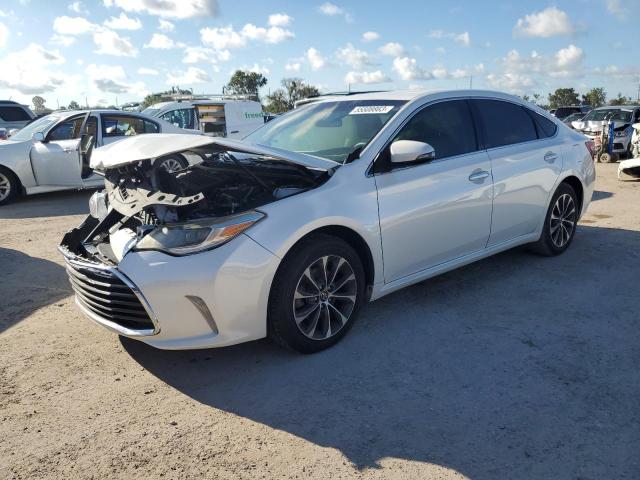 TOYOTA AVALON XLE 2016 with VIN 4T1BK1EB3GU230424 - Photo from auction